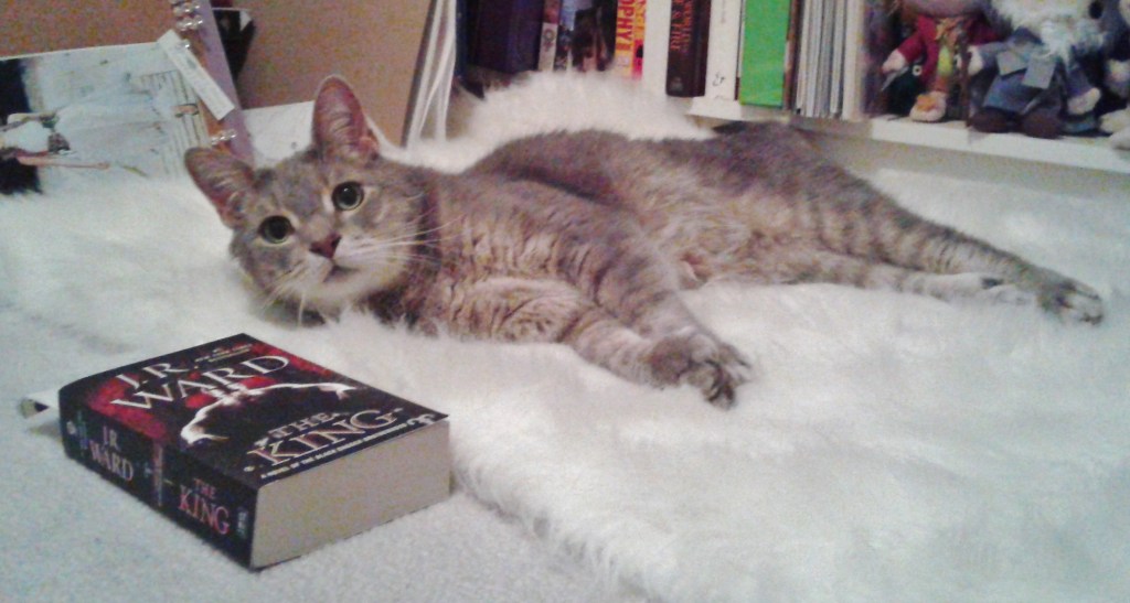 Me? I'm not reading anythi--oh, what the hell.  I'm reading JR Ward. Okay? Happy?  Now get the hell away from me. Wrath and Beth are totally gonna get it on.